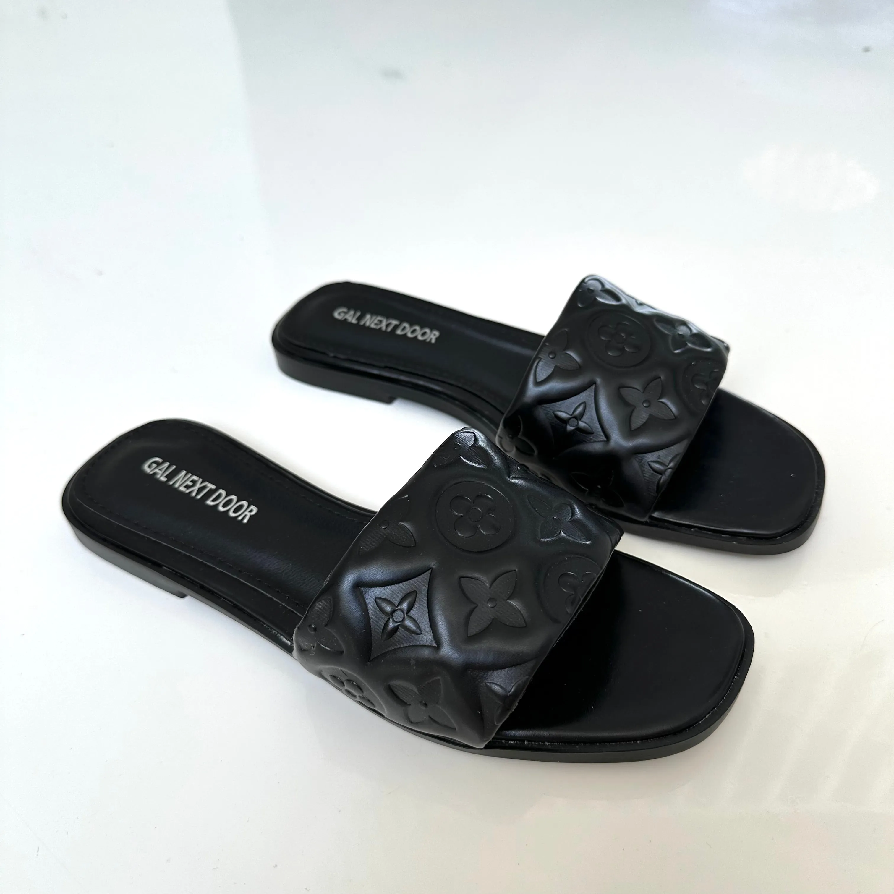 Jumeirah- Black Floral Embossed Sandals