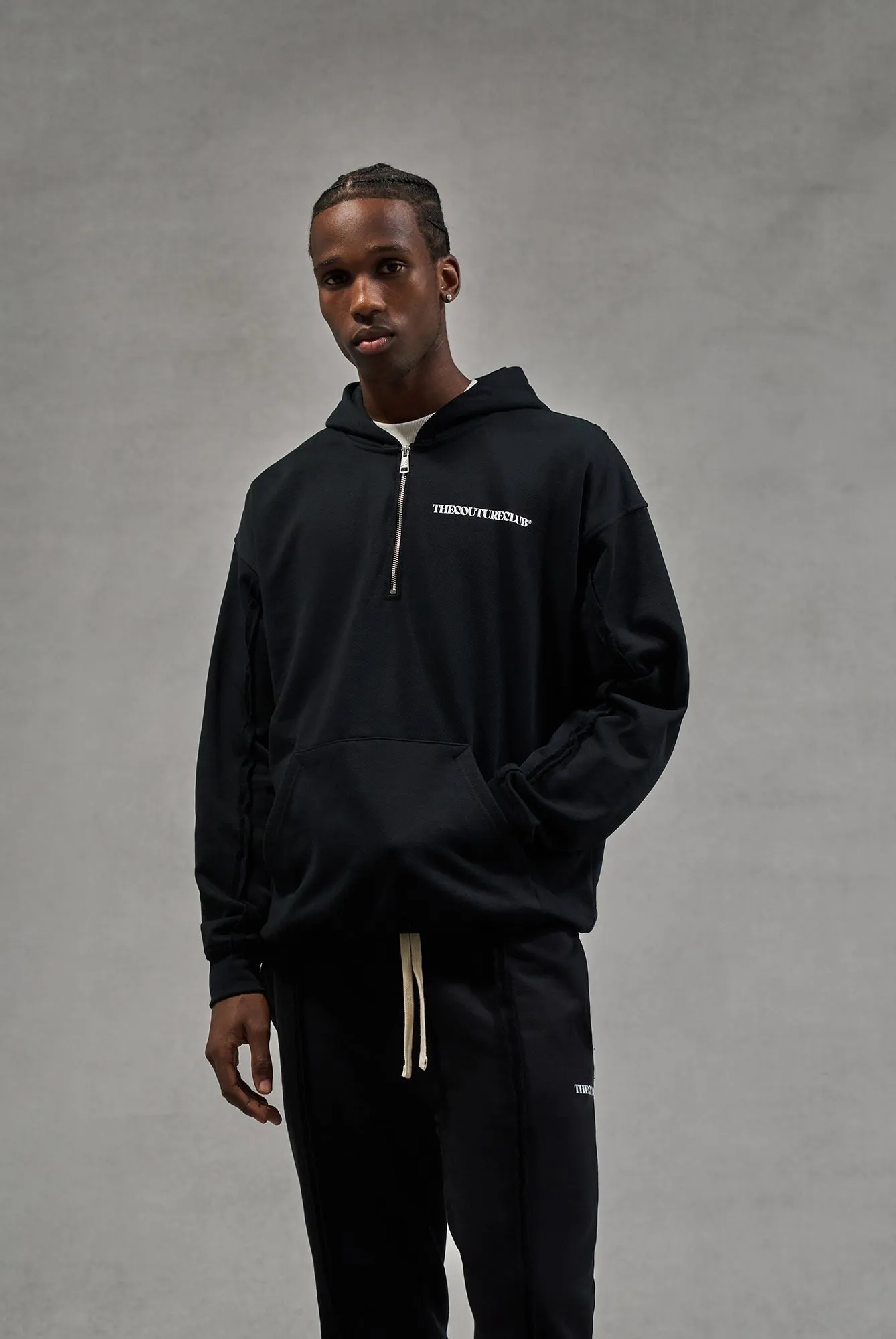 RAW SEAM QUARTER ZIP HOODIE - BLACK