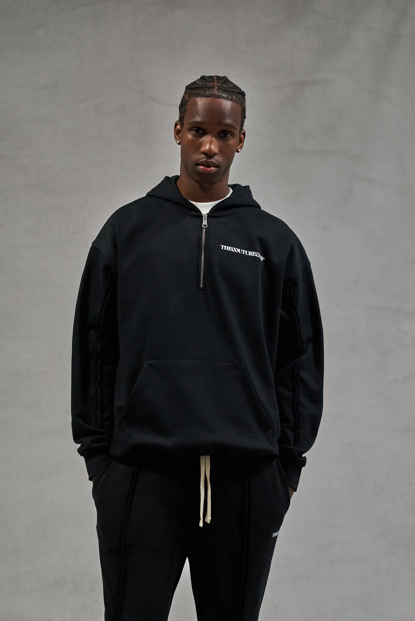 RAW SEAM QUARTER ZIP HOODIE - BLACK