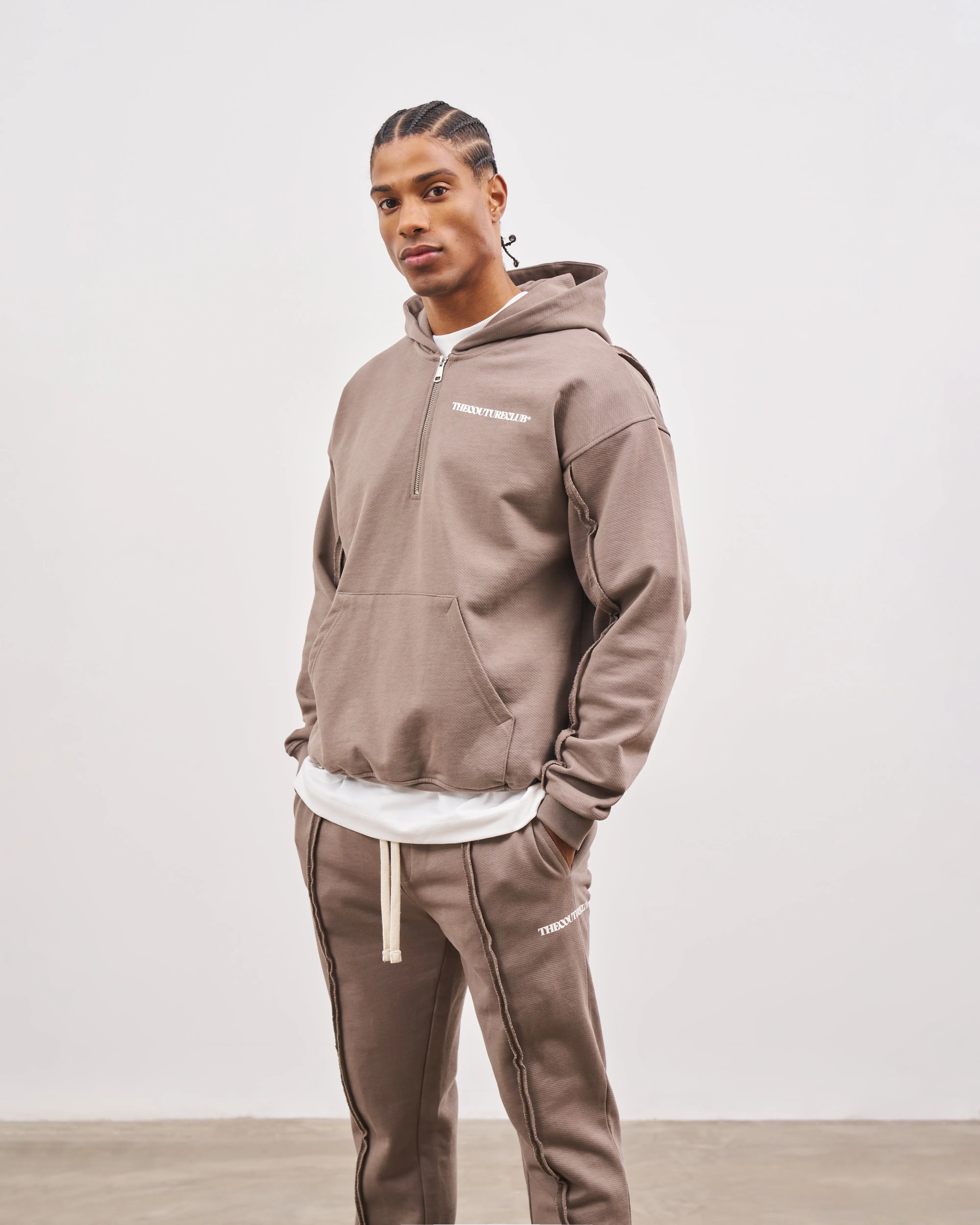 RAW SEAM QUARTER ZIP HOODIE - COFFEE